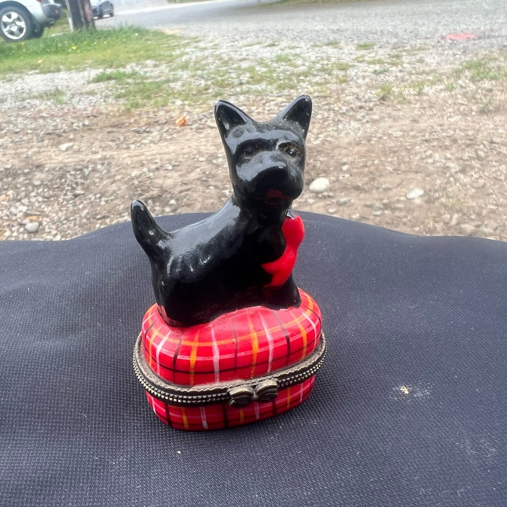Black and Red Dog Figurine with Plaid Base